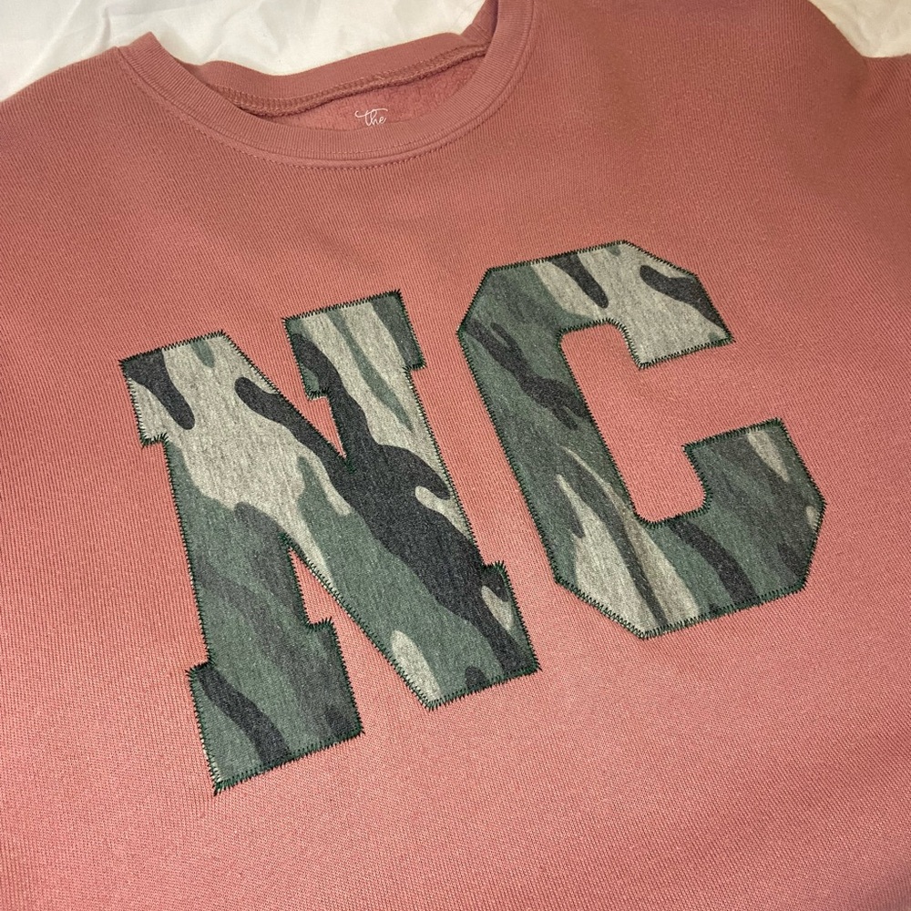 Mauve Sweatshirt with Camouflage NC Letters North Carolina Women’s